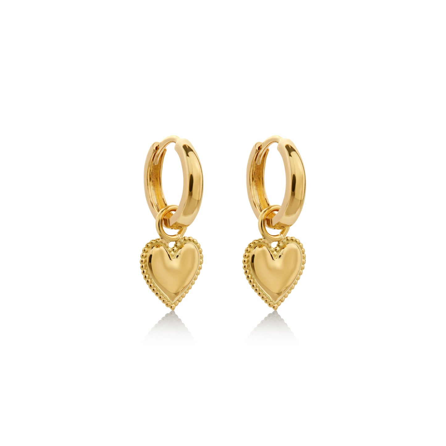 Pendientes y argollas de 18k, elaboradas a mano por artesanos peruanos. Trazabilidad en cada pieza.
